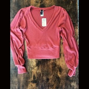 Slightly cropped light sweater